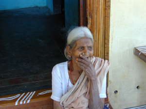Sasikila's grandmother shares a joke at the family home.