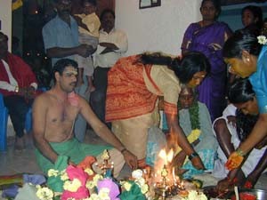 A Brahmin priest will complete the housewarming rituals at an auspicious time which is chosen by the astronomers.