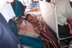 A small child, who has given her hair to Lord Venkateshwara at Tiraputi Temple.