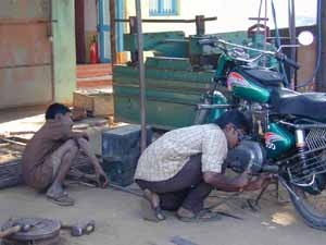 Bicycle and motor bike repairs keep mechanics busy.