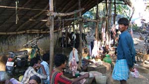 Each market day fresh goat meat is prepared and sold.