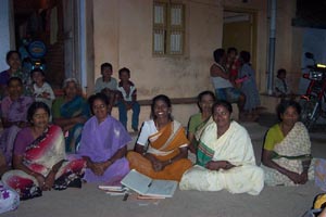 Members of the Kamatchiammanpet Women's Self Help Group attend a business meeting.