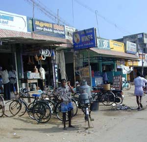 The road through K.V.Kuppam is lined with shops selling a wide range of goods.